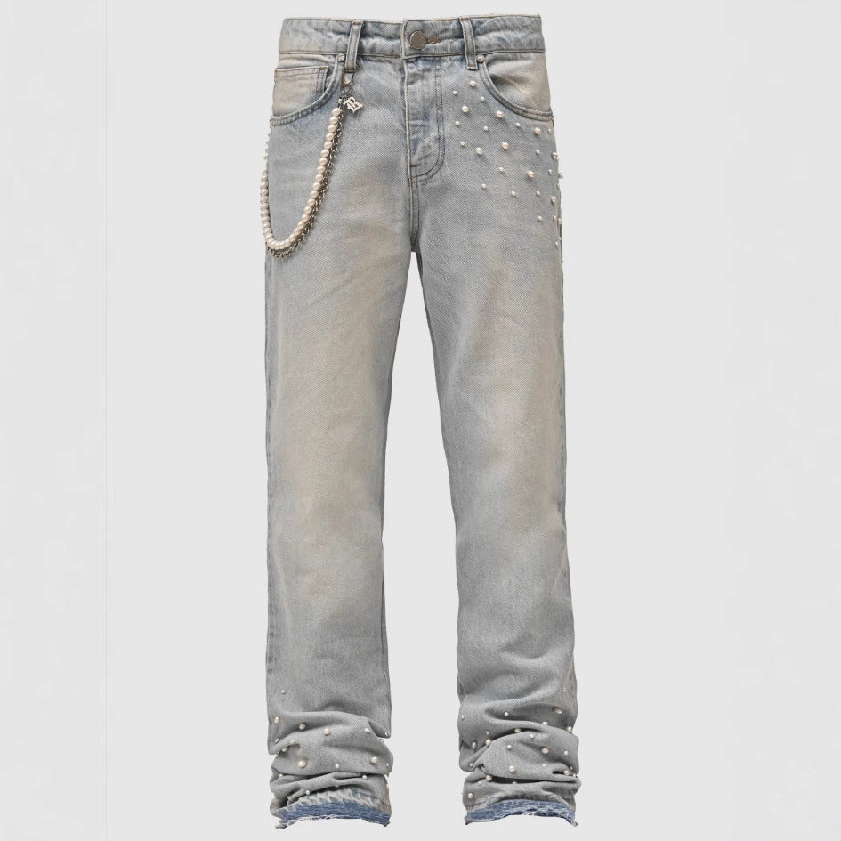 Damejeans med perleapplikationer og moderne snit Stilla