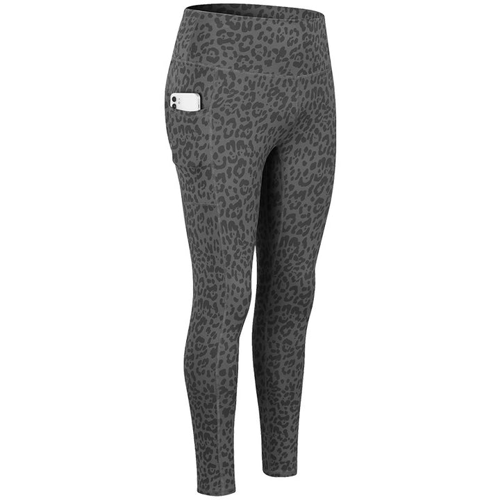 Dame Kvalitets Performance-Leggings med praktiske sidelommer og elastisk talje Stilla