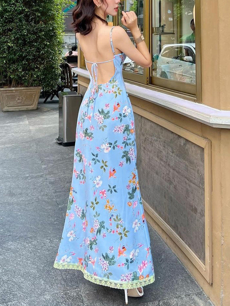 Dame maxikjole med blomstermønster og elegant rygudskæring Stilla