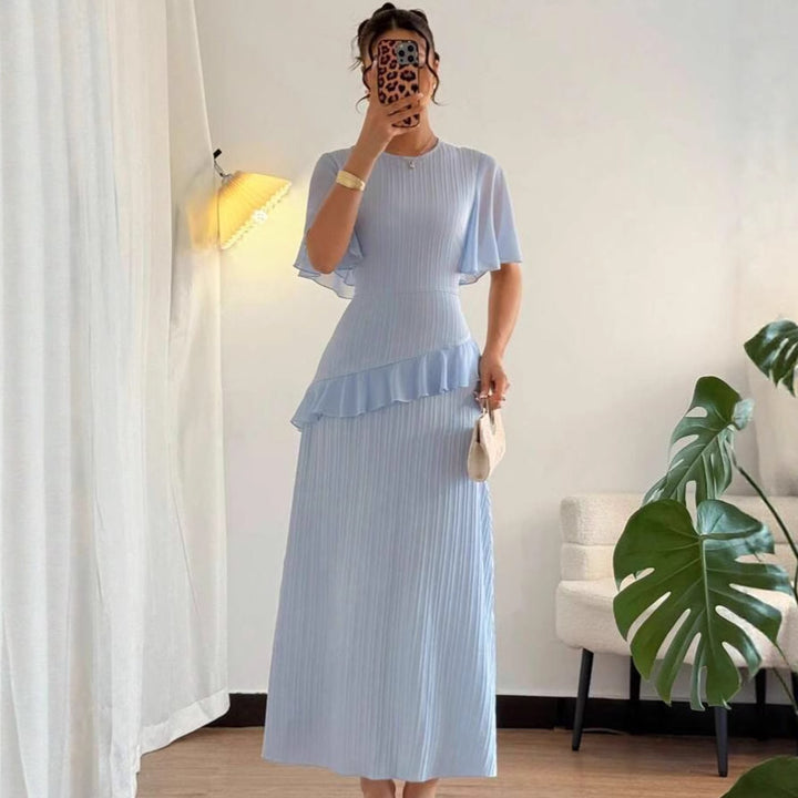 Damer elegant maxikjole med plisserede detaljer og flydende hem Stilla