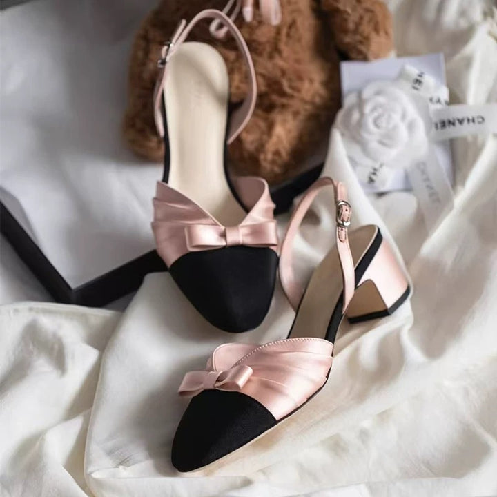 Dame Slingback-pumps med elegant satindetalje og struktureret sål Stilla