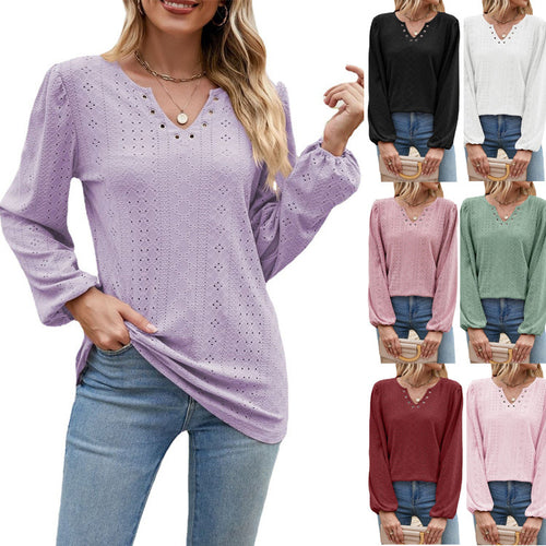 Damebluse med elegant spidsstruktur og V-hals Stilla