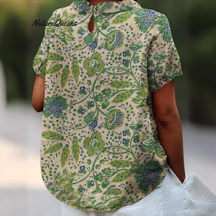 Dame kortærmet bluse med kunstnerisk blomsterprint Stilla