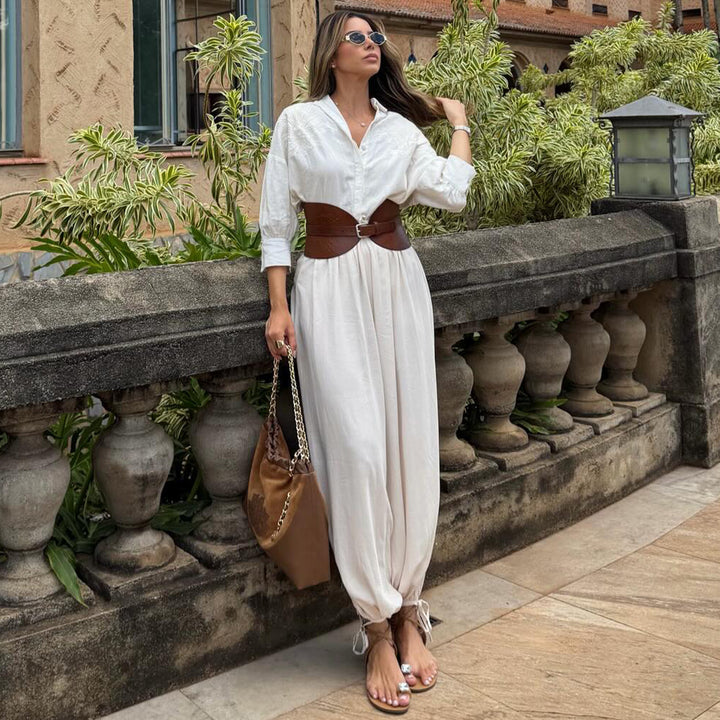 Kvindernes voluminøse jumpsuit med elegant knapbluse og taljebælte Skovae