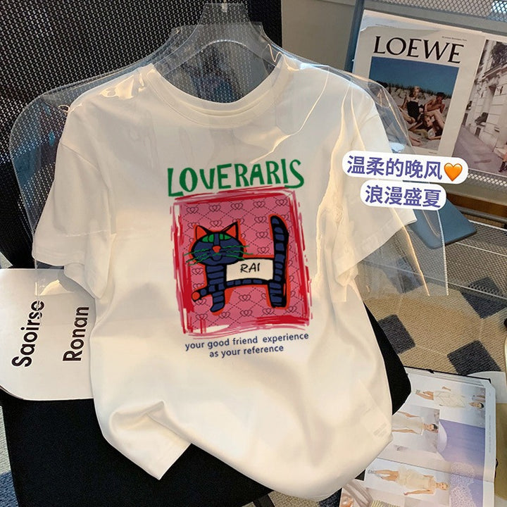 Dame T-shirt med kreativ kattemotiv og moderne tryk Stilla