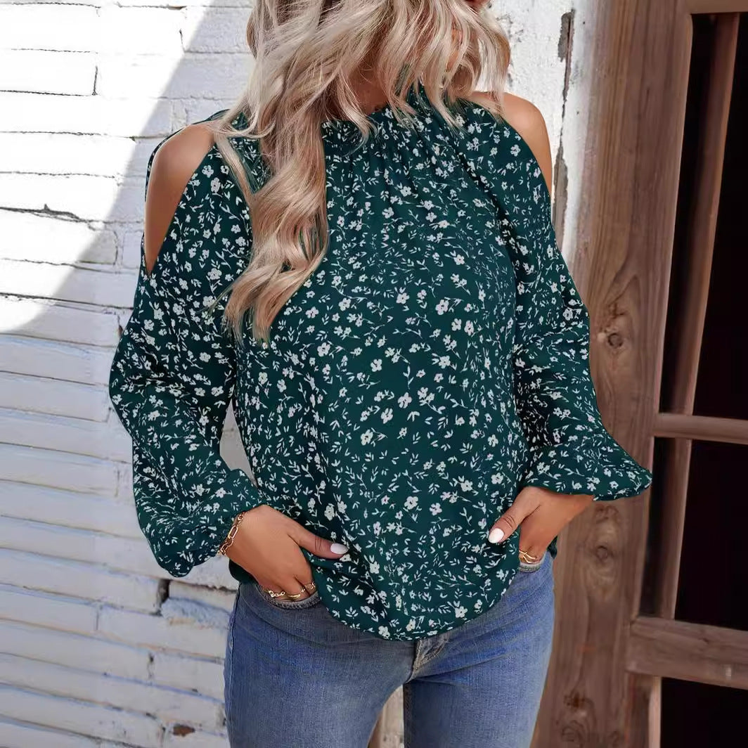Damebluse i elegant cold-shoulder-design med florale accenter Stilla