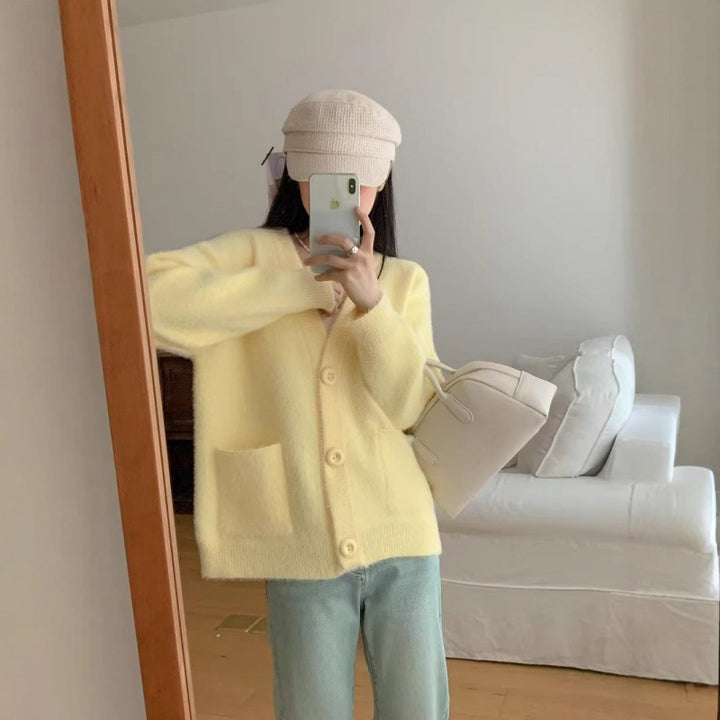 Kvinders fluffy knap cardigan med elegante lommer Stilla
