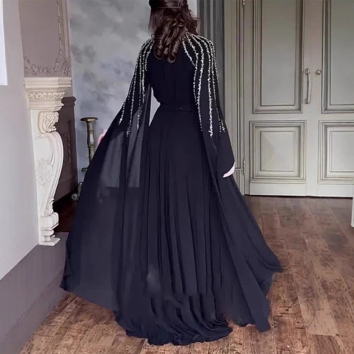 Dame Maxikjole med elegante, lange ærmer og detaljeret perleudsmykning Stilla