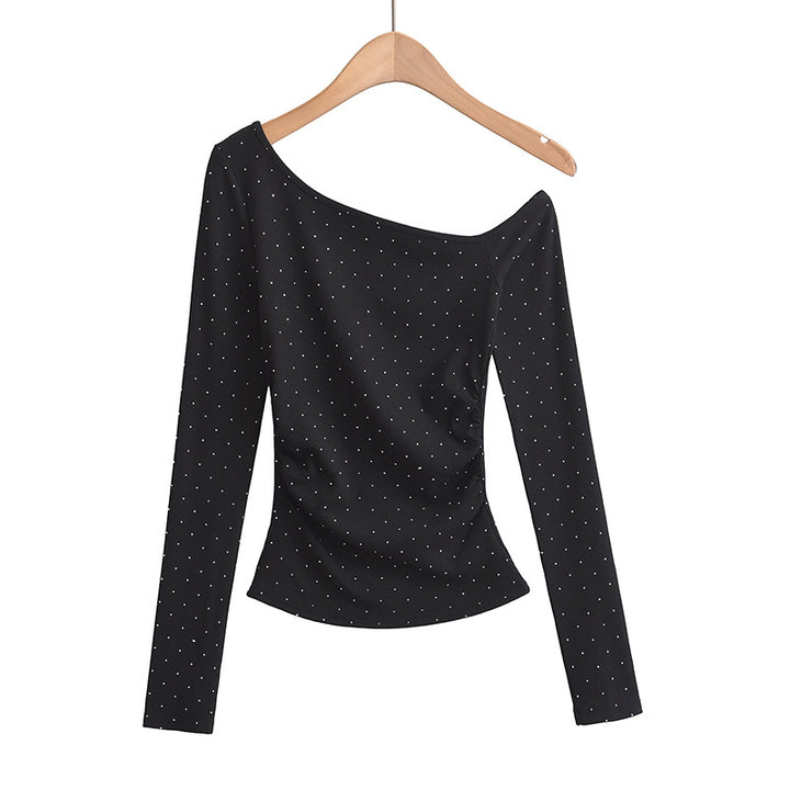 Dame asymmetrisk longsleeve-top med elegant ruffle-design og figurformende snit Stilla