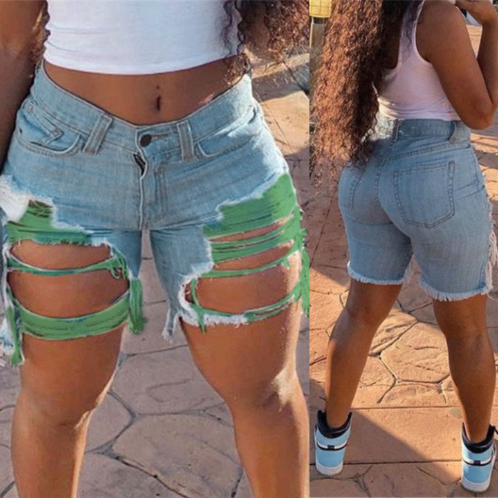 Dame Jeans-shorts med markante revnedetaljer og frynsende kant Stilla