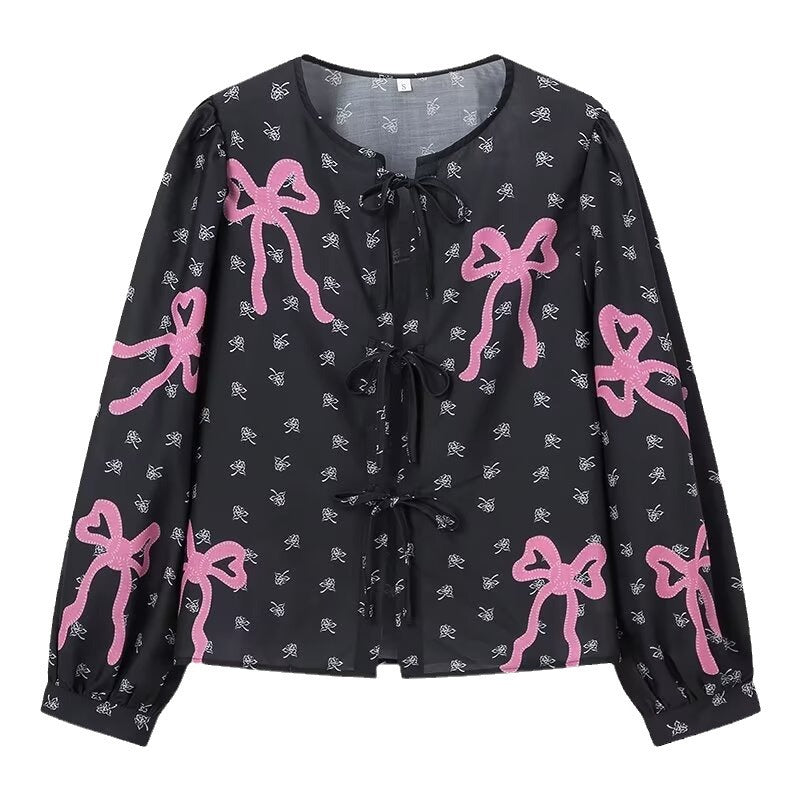 Damebluse med legende sløjfedesign og raffinerede detaljer Stilla