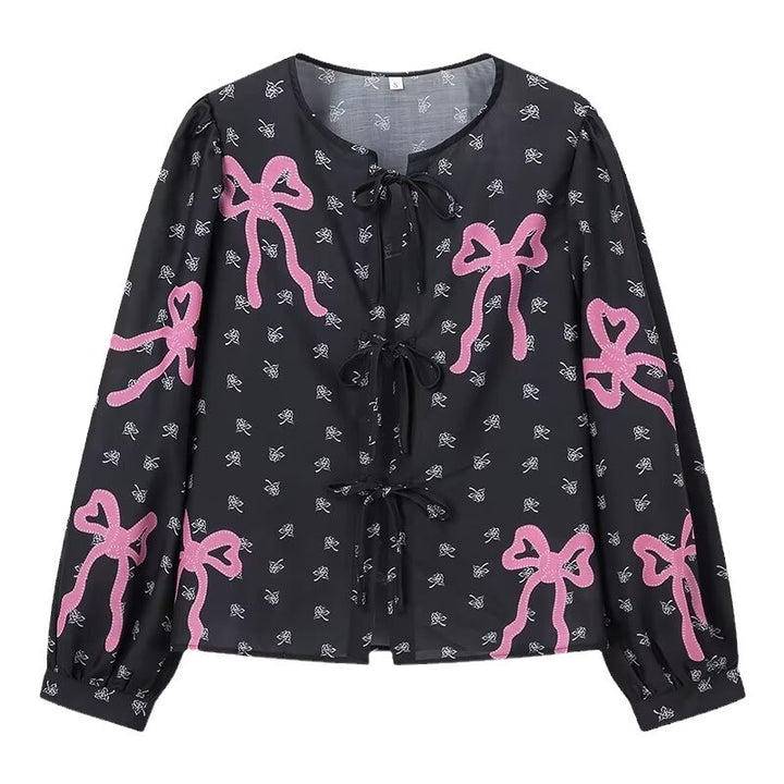 Damebluse med legende sløjfedesign og raffinerede detaljer Stilla