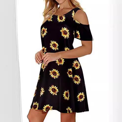 Kvinders sommerkjole med blomsterdesign og off-shoulder snit Stilla