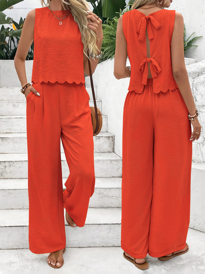 Dame afslappet jumpsuit med elegant laceindsats og bred ben Stilla