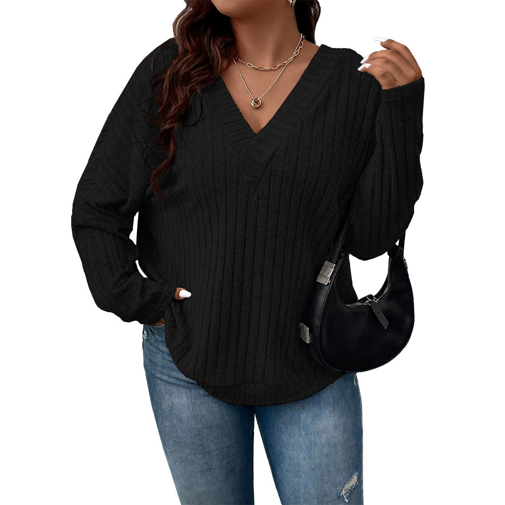 Dame løs sweater med V-hals og ribstruktur Stilla