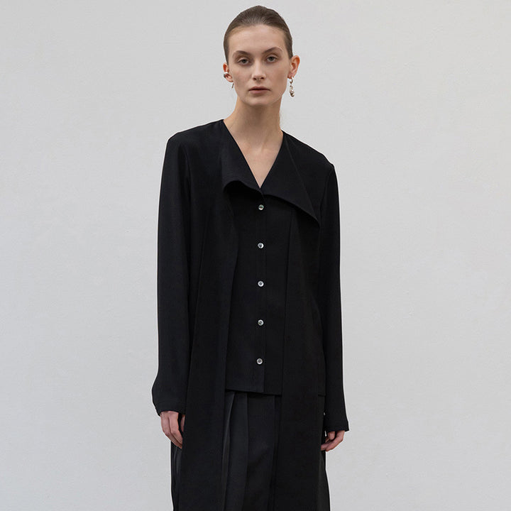 Dame elegant bluse med asymmetrisk snit og kvalitets knapdetaljer Stilla