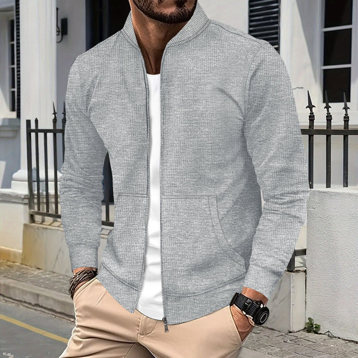 Herrer sporty zip-jakke med struktureret design og praktiske lommer Stilla