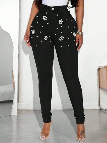 Dame skinny jeans med glitrende dekorationer Stilla