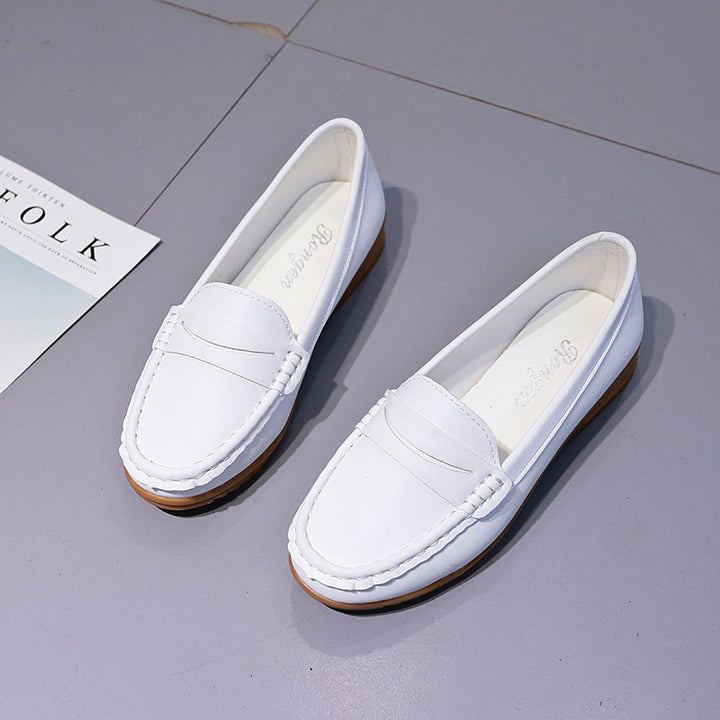 Dame mokassinlignende slippers med håndsyet detalje og komfortabel sål Stilla