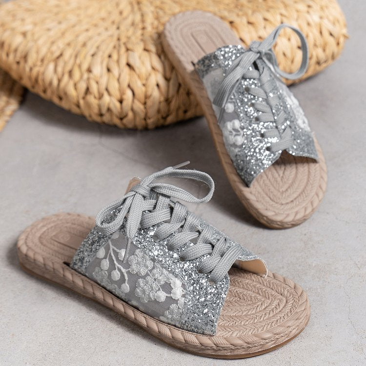 Dame elegante glimmersandaler med floralt design og snørebånd Stilla
