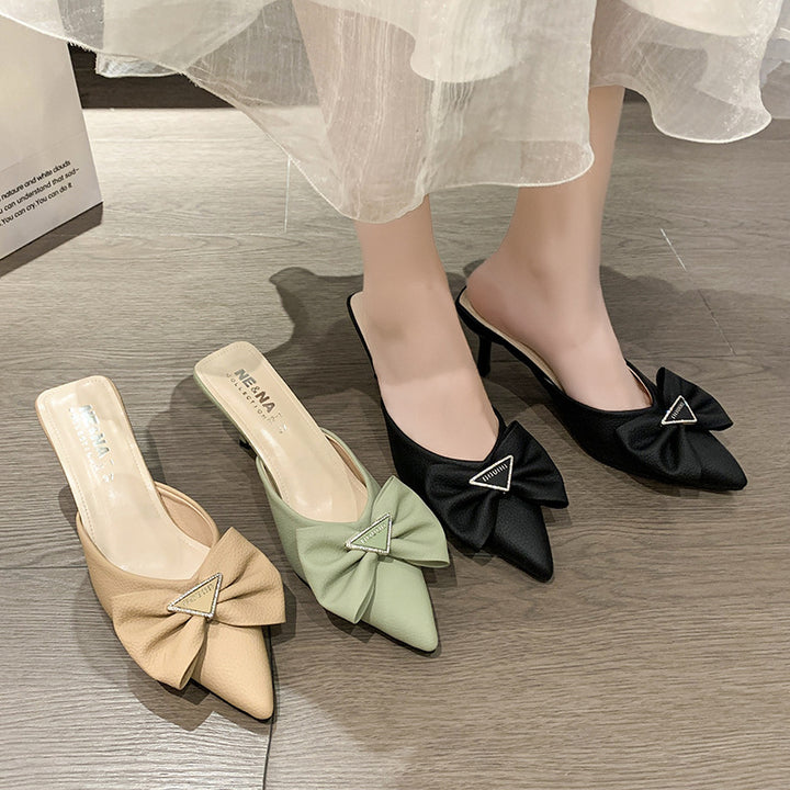 Dame Slingback-sandaler med dekorativ sløjfe-applikation og elegant spids-design Stilla