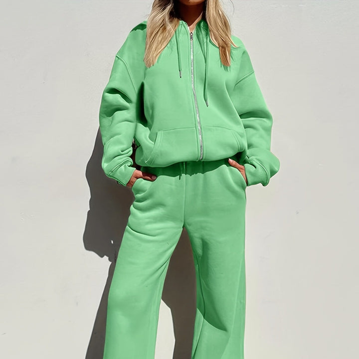 Kvinders afslappet fritidssæt med moderne oversized hoodie og løse bukser