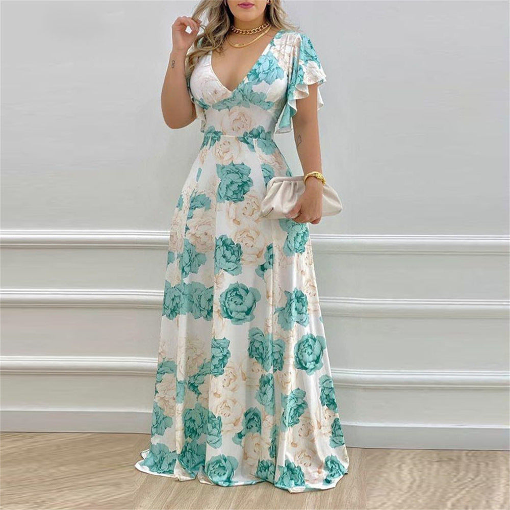 Dame Maxikjole med floralt design og elegante flæsedetaljer Stilla