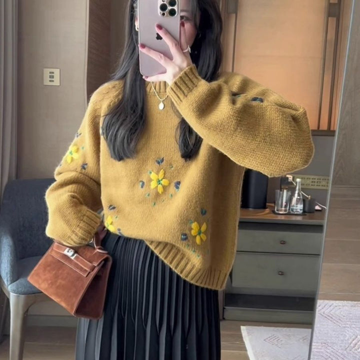 Kvinders strikket sweater med blomsterapplikationer Stilla