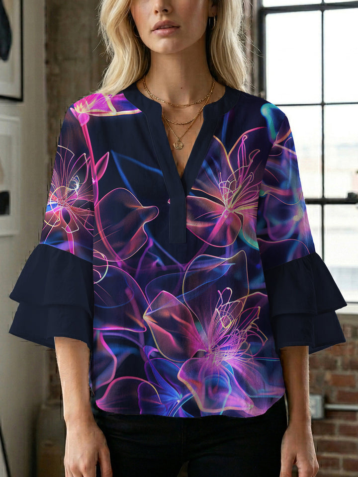 Damebluse med voluminøse flæseærmer og blomstermønster Skovae