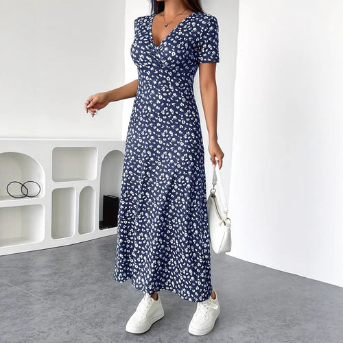 Dame Maxikjole med floral indpakningsdesign og praktiske sidelommer Stilla