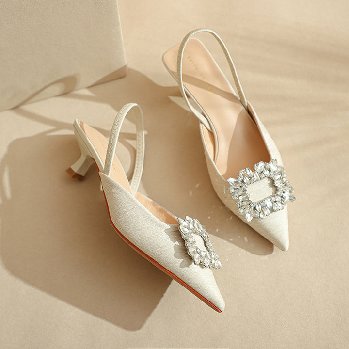 Femme Elegante Slingback-hæle med dekorativt blomsterdetalje Stilla
