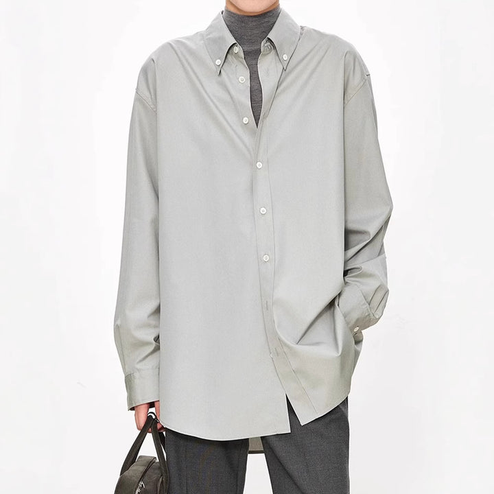 Damer elegant oversized bluse med klassiske knapdetaljer Stilla