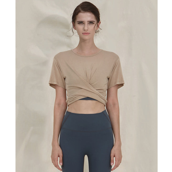 Dame sporty kortærmet T-shirt med trendy vikledetalje og elastisk kant Stilla