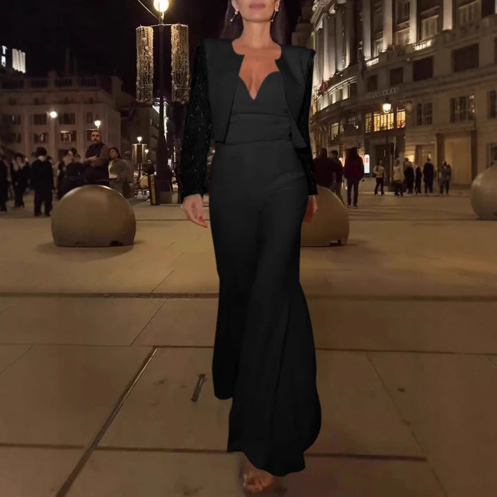 Dame Elegant jumpsuit med raffineret V-udskæring og svingende ben Stilla