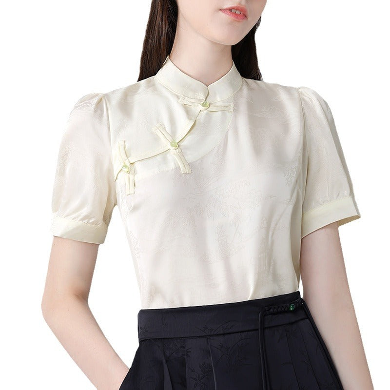 Damebluse med elegant ståkrave og kunstneriske knapdetaljer Stilla
