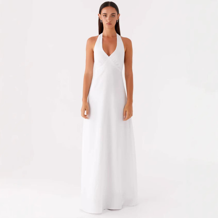 Dame Maxikjole med elegant halterneck-design og figurskærende snit Stilla