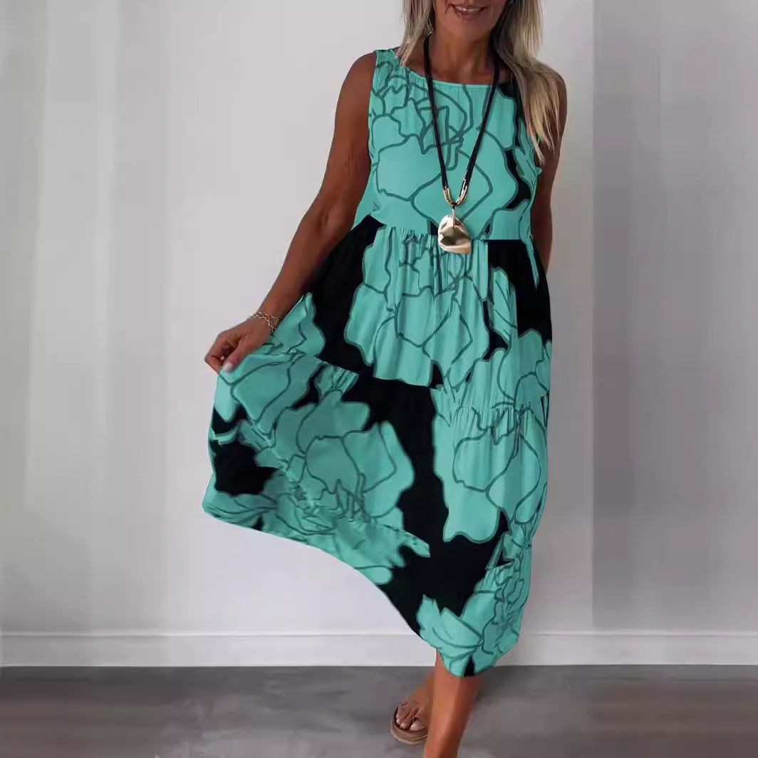 Dame Midikjole med asymmetrisk kant og blomstret print Stilla