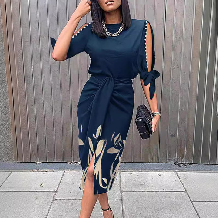 Elegant midi-kjole til kvinder med stilfulde cut-out-ærmer Stilla