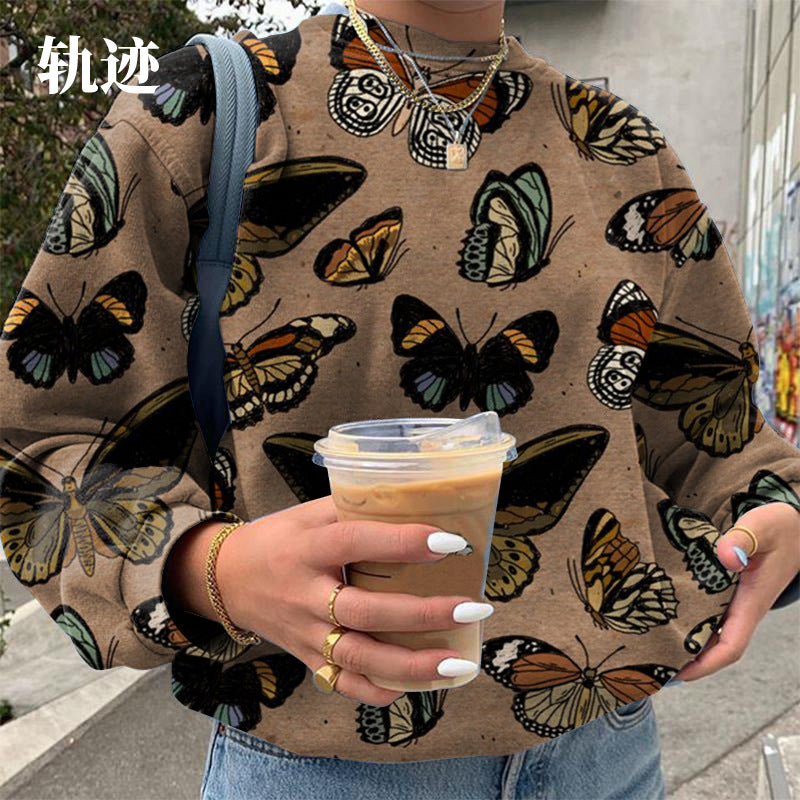 Dame sweatshirt med kreativ sommerfuglemotiv og afslappet snit Stilla