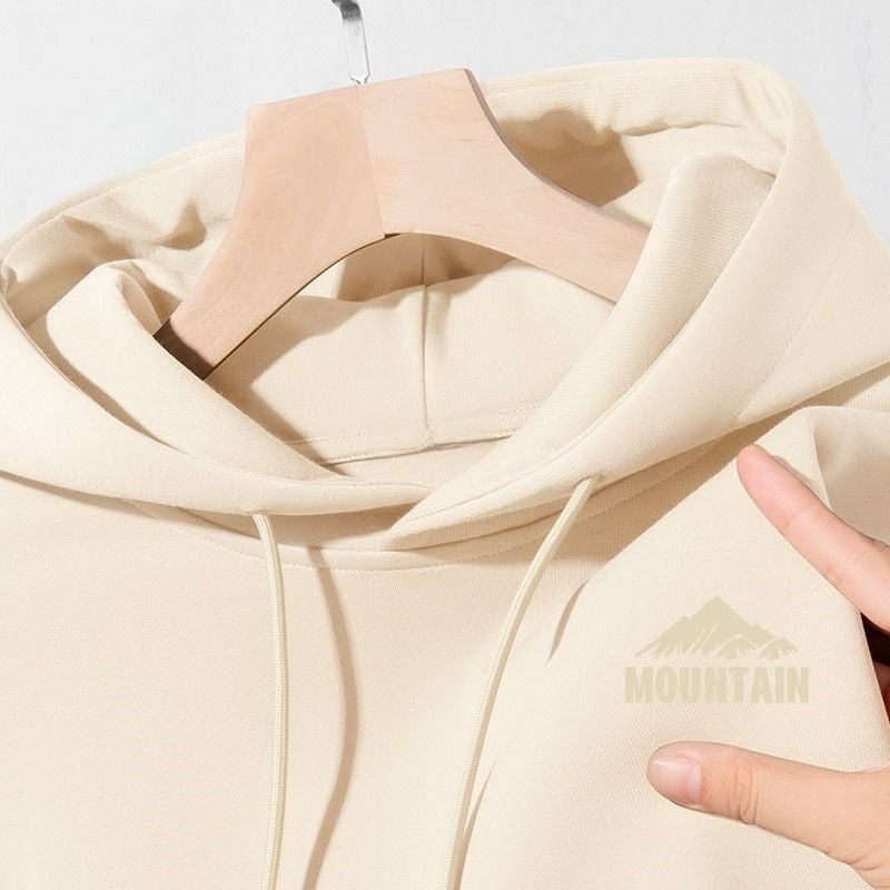 Kvinders hættetrøje med moderne bjergmotiver og praktiske lommer Skovae