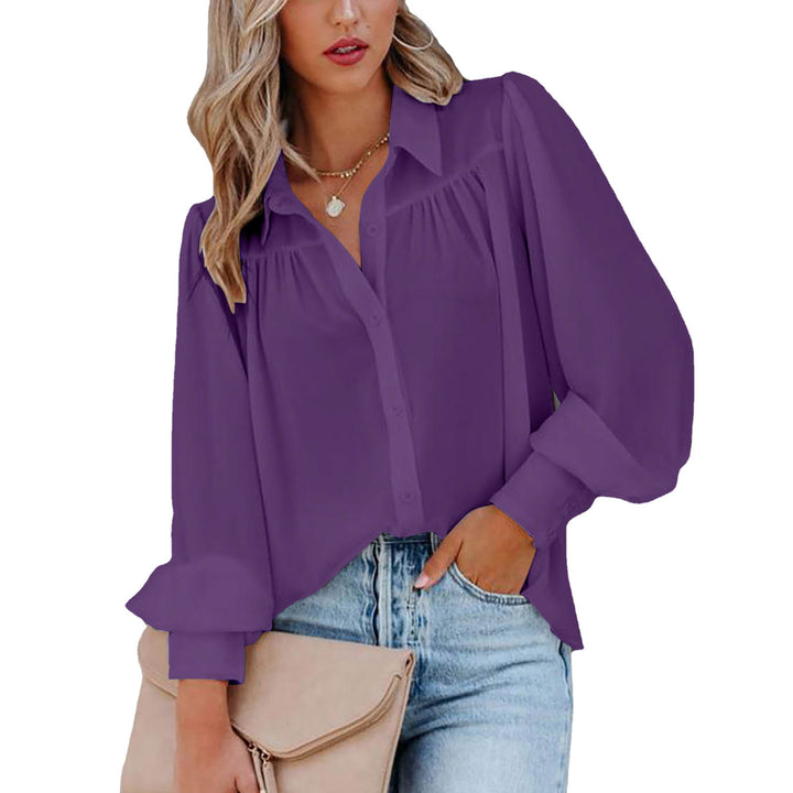 Dame elegant bluse med voluminøse ærmer og knapdetaljer Stilla