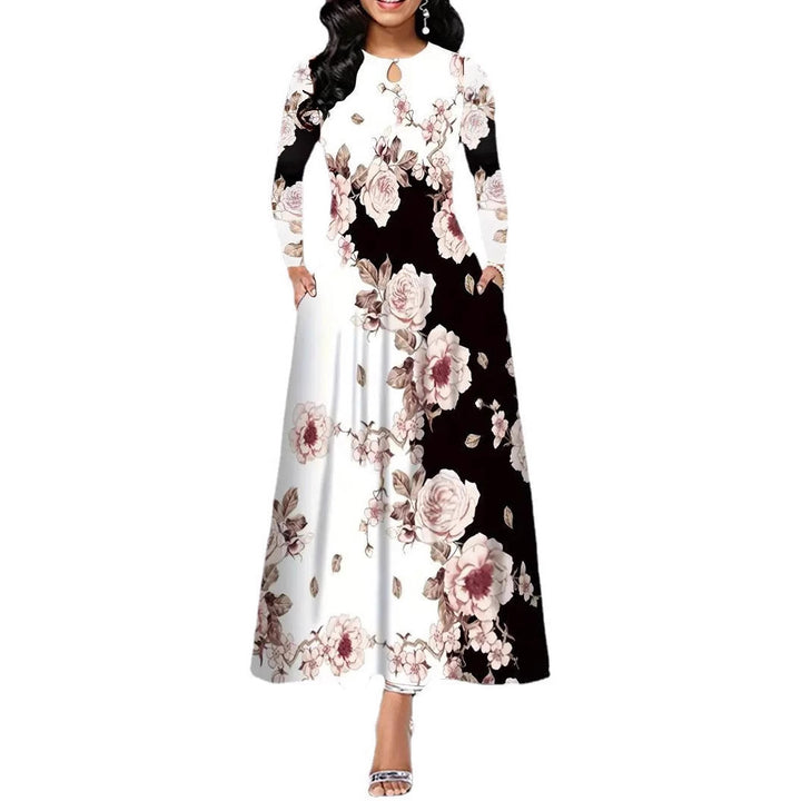 Dame Maxikjole med blomsterdesign og praktiske lommer Stilla