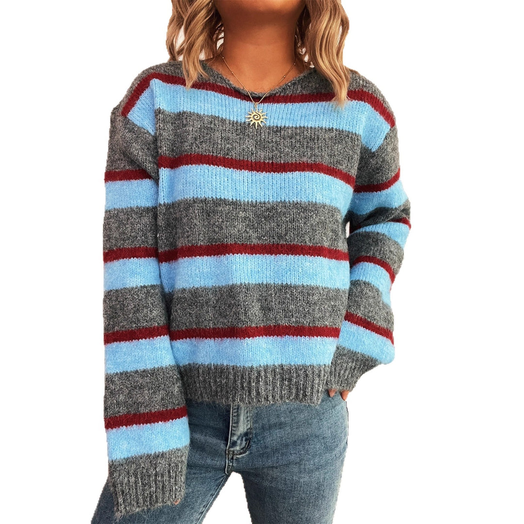 Kvinders afslappede strikket sweater med farverigt stribet mønster og brede ærmer Stilla