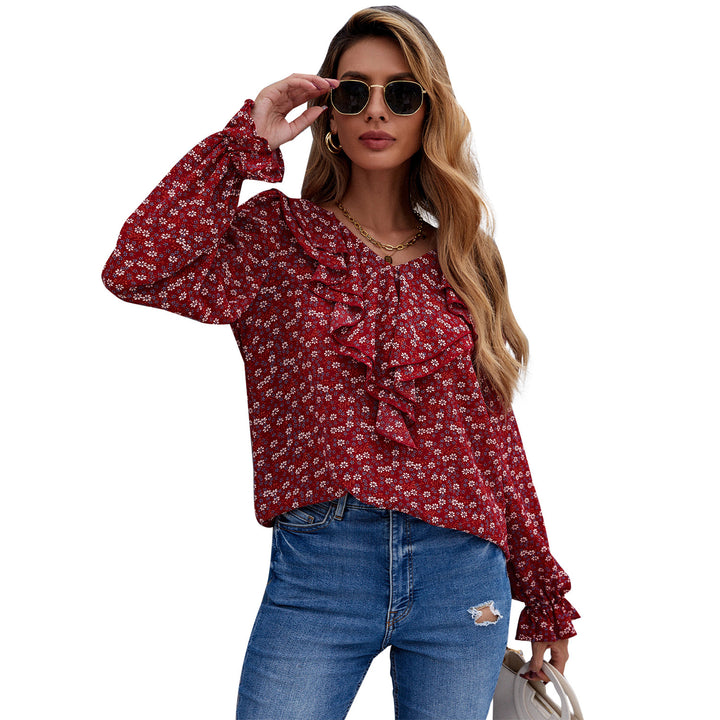 Kvinders bluse med flæsedetaljer og blomsterprint Stilla