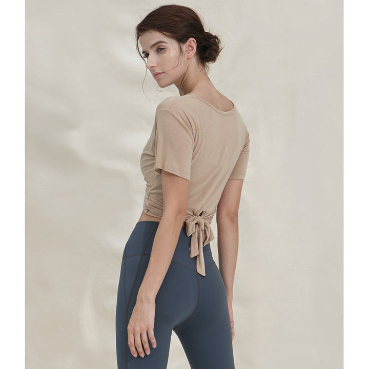 Dame sporty kortærmet T-shirt med trendy vikledetalje og elastisk kant Stilla