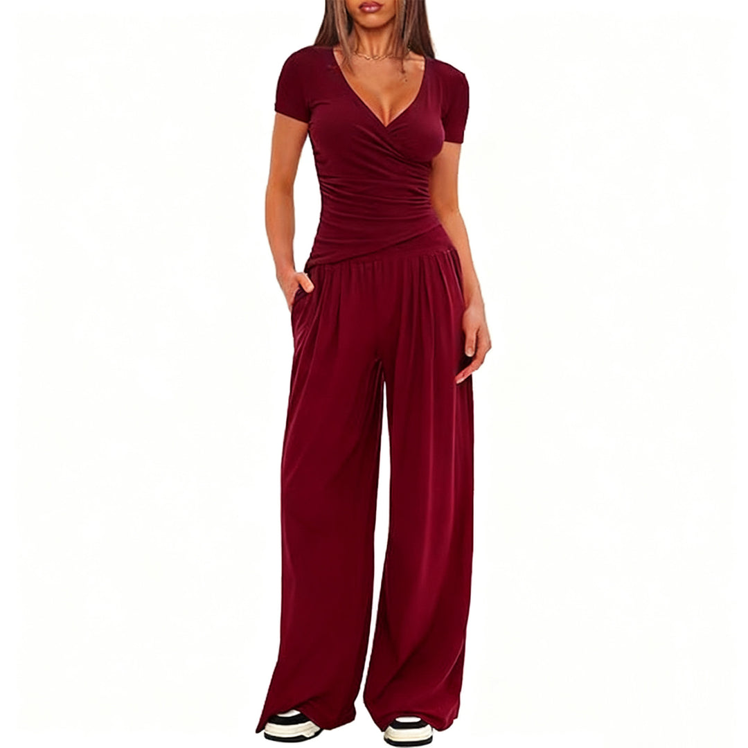 Dame afslappet jumpsuit med omslagsdesign og bredt ben Skovae