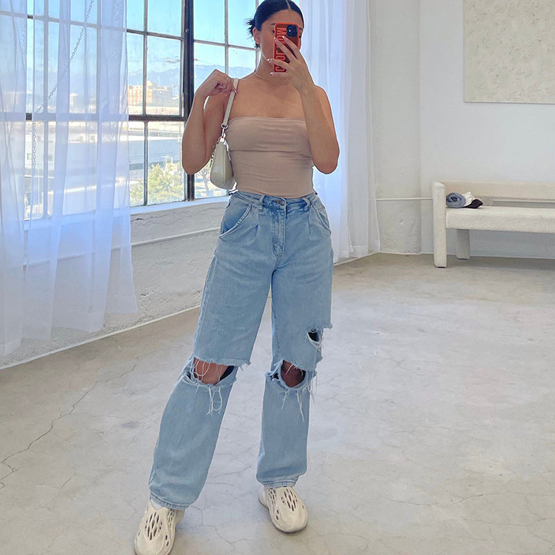 Dame Ripped Wide-Leg Jeans i en afslappet vintage-stil med frynset detaljer og høj talje Stilla