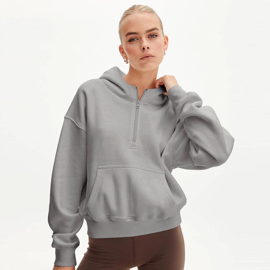 Dame hoodie med halv lynlås og oversized fit Stilla