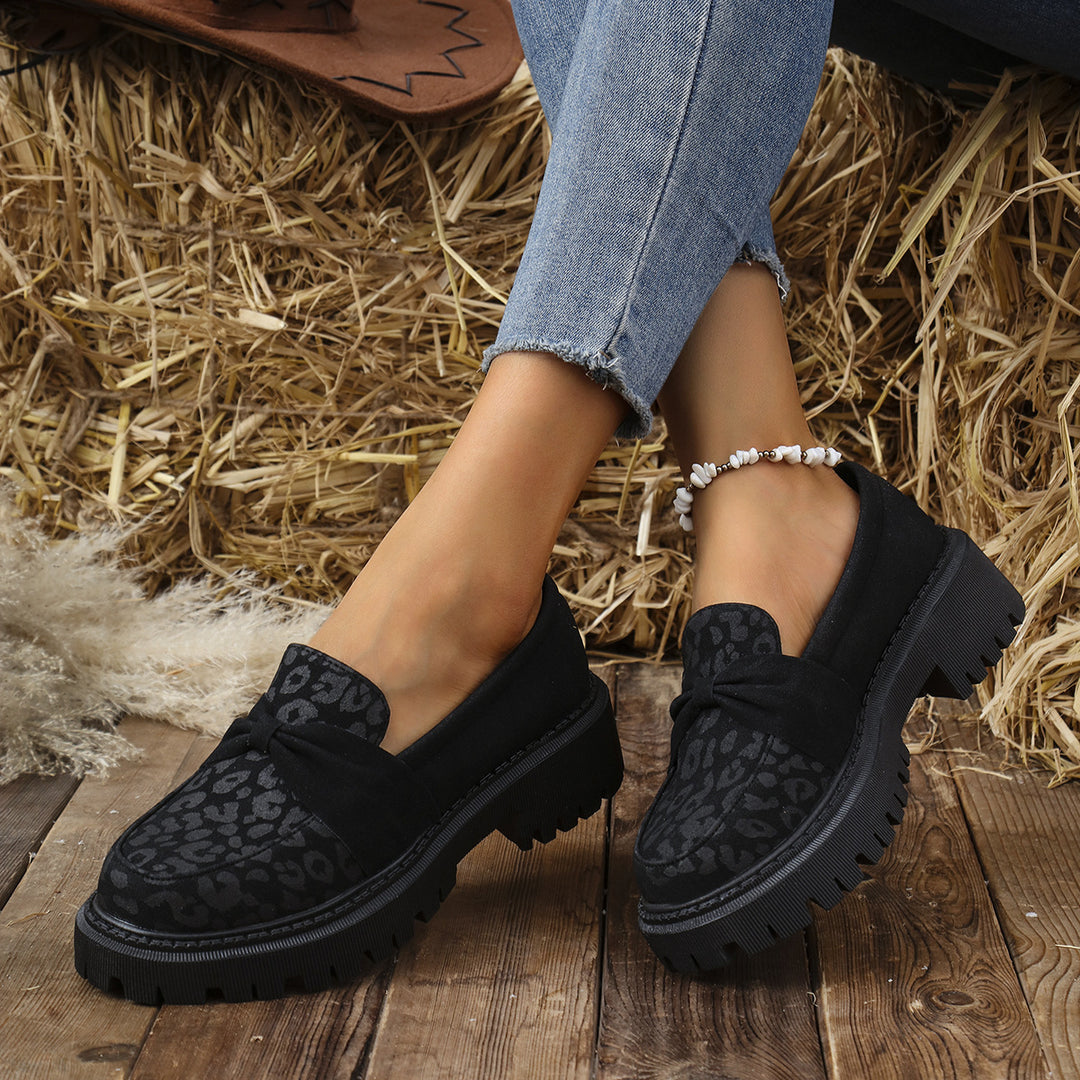 Dame Komfortable og moderigtige slippers med elegant sløjfedekoration Stilla