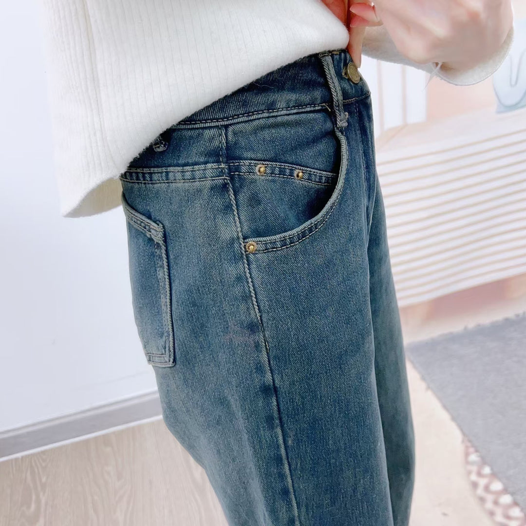 Dame brede high-waist jeans med elegant snit og minimalistiske detaljer Stilla